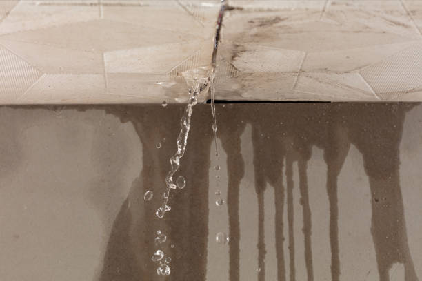 Professional Flood Damage Cleanup technician working in Ada, OK